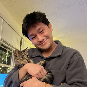 A professional portrait of David Vu.