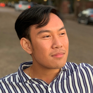 A professional portrait of Uddom Lee.